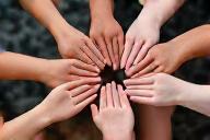 Hands held together in a circle